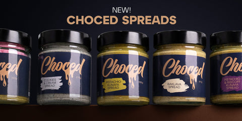Five jars of Choced spreads on a dark background with 'NEW! Choced Spreads' text.