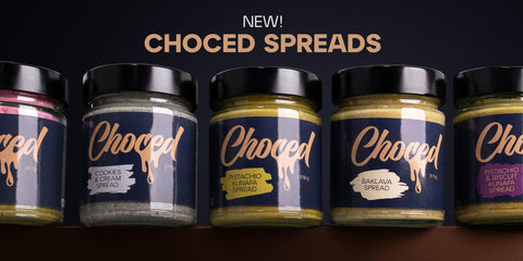 Five jars of Choced spreads on a dark background with 'NEW! Choced Spreads' text.